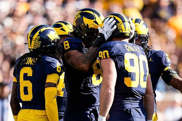 Jordan Young (6), Dom Nichols (8), and John Henry Daley (90)