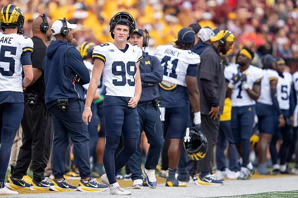Stuart Blake (35), Trey Butkowski (99), and Tariq Boney (41)