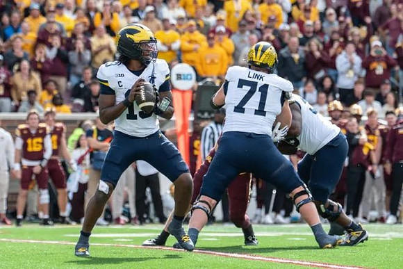 Bryce Underwood (19) and Evan Link (71)