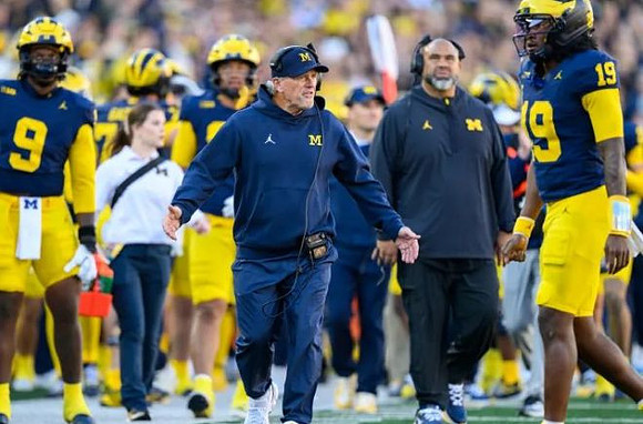 Kyle Whittingham and Michigan Team