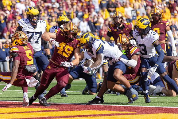 Blake Frazier (77), Jordan Marshall (23), Jalen Hoffman (42), and Andrew Marsh (3)