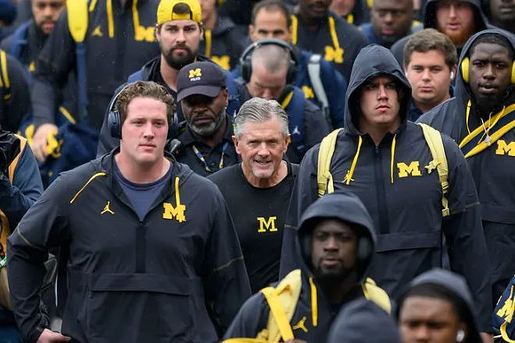Kyle Whittingham and Michigan Team