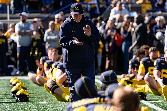 Kyle Whittingham and Michigan Team