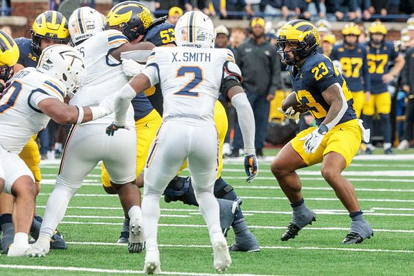 Jordan Marshall (23) and Jake Guarnera (53)