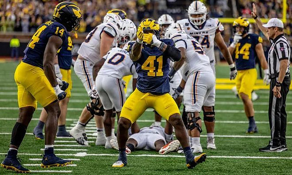 Carter Meadows (14), Tariq Boney (41), and Nathaniel Staehling (44)