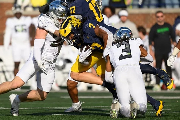 Marlin Klein (17) and Donovan Edwards (7)