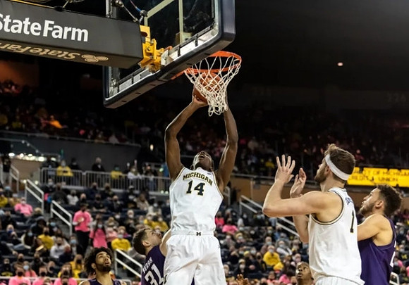 Moussa Diabate (14) and Hunter Dickinson (1)