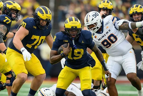 Blake Frazier (77), Brady Norton (70), and Bryce Underwood (19)