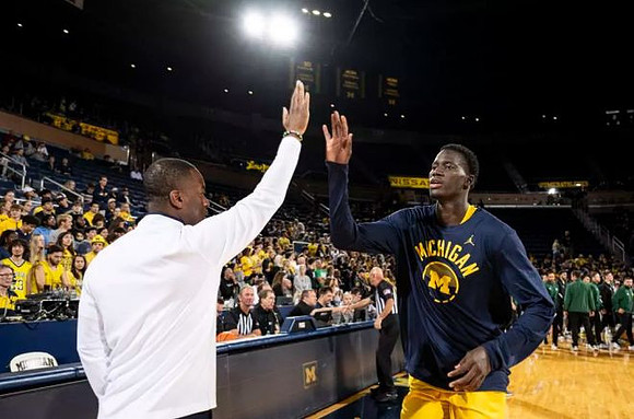 Mike Boynton Jr. and Moustapha Thiam (52)
