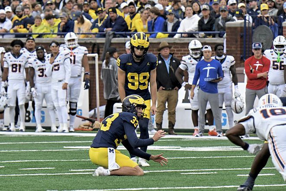 Cam Brown (33) and Trey Butkowski (99)