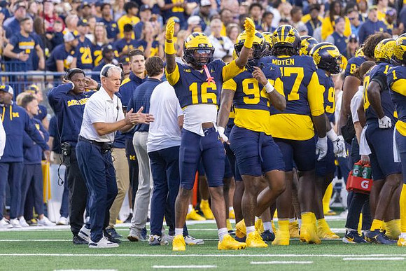 Kerry Coombs and Michigan Team