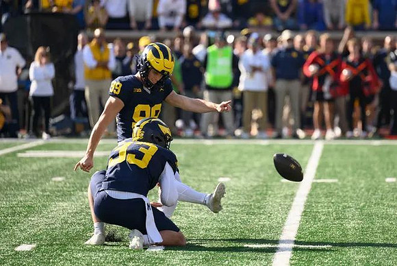 Cam Brown (33) and Trey Butkowski (99)
