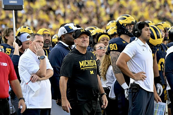 Kyle Whittingham and Michigan Team