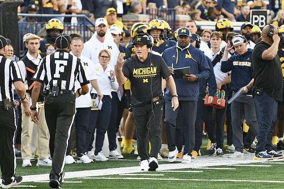 Kyle Whittingham and Michigan Team