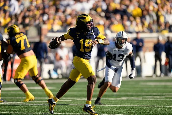 Blake Frazier (77) and Bryce Underwood (19)
