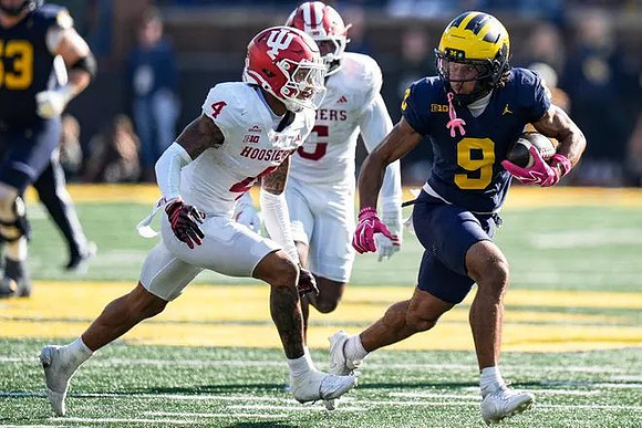 Jake Guarnera (53) and Channing Goodwin (9)