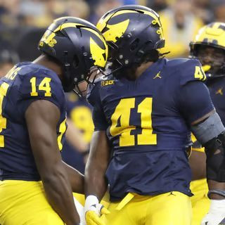 Carter Meadows (14) and Tariq Boney (41)