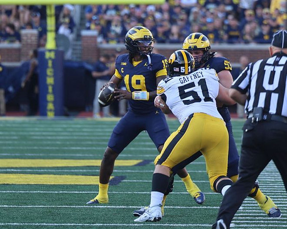 Bryce Underwood (19) and Jake Guarnera (53)