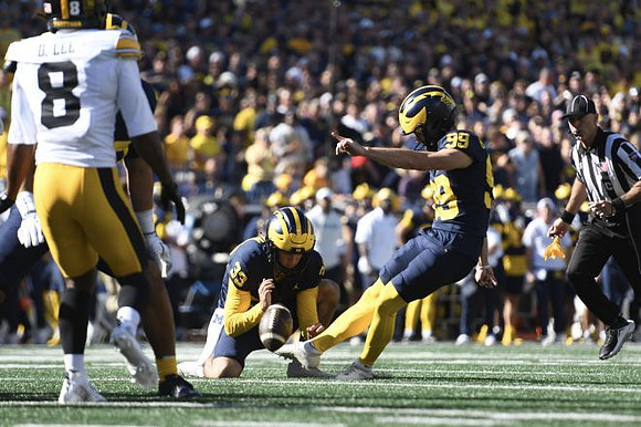 Cam Brown (33) and Trey Butkowski (99)