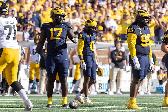 Enow Etta (17), Jyaire Hill (0), Trey Pierce (95), and Nathaniel Staehling (44)