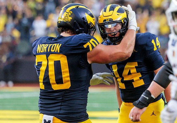 Brady Norton (70) and Tommy Carr (14)
