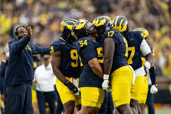Cam Brandt (9), Deyvid Palepale (54), and Enow Etta (17)