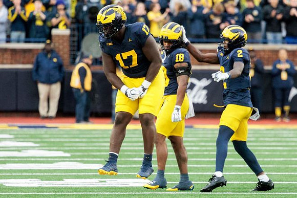 Enow Etta (17), Troy Bowles (18), and Shamari Earls (2)