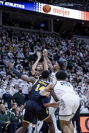 Hunter Dickinson (1) and Moussa Diabate (14)