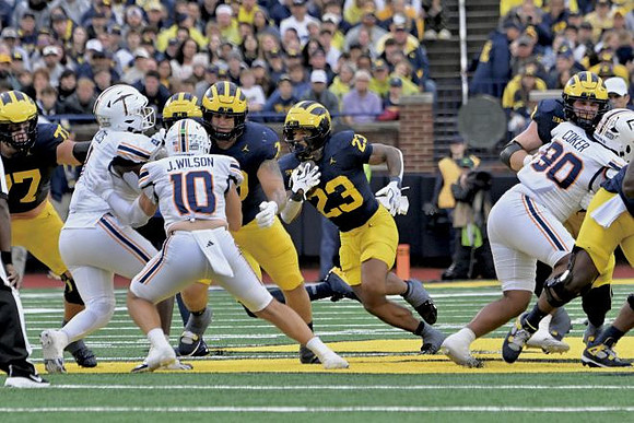 Blake Frazier (77), Brady Norton (70), and Jordan Marshall (23)