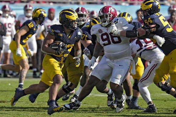 Kendrick Bell (12), Jordan Marshall (23), Evan Link (71), and Andrew Sprague (54)
