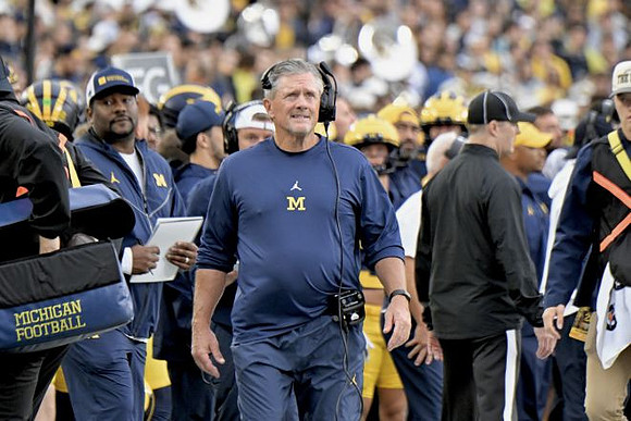 Kyle Whittingham and Michigan Team