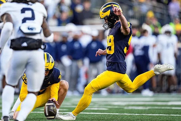 Cam Brown (33) and Trey Butkowski (99)
