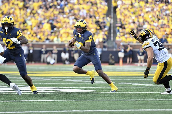 Jalen Hoffman (42) and Bryce Underwood (19)