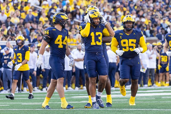 Smith Snowden (3), Nathaniel Staehling (44), Aisea Moa (13), and Trey Pierce (95)
