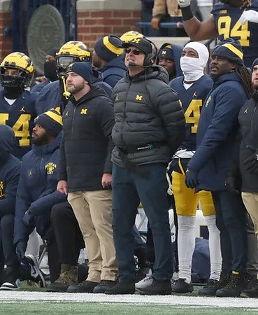 Jim Harbaugh and Denard Robinson