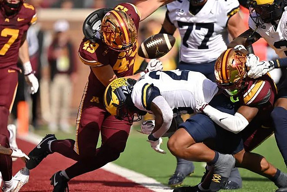 Jordan Marshall (23) and Blake Frazier (77)