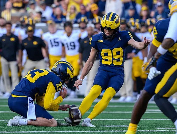 Cam Brown (33) and Trey Butkowski (99)