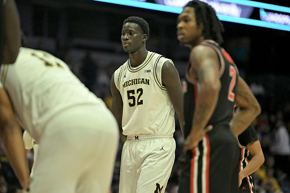 Roddy Gayle Jr. (11) and Moustapha Thiam (52)