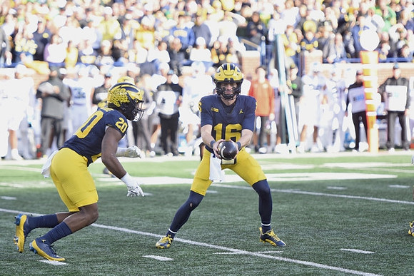 Kalel Mullings (20) and Davis Warren (16)