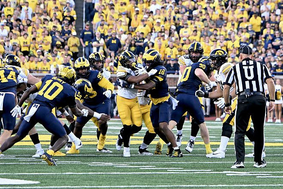 Nathaniel Staehling (44), Zeke Berry (10), Trey Pierce (95), and John Henry Daley (90)