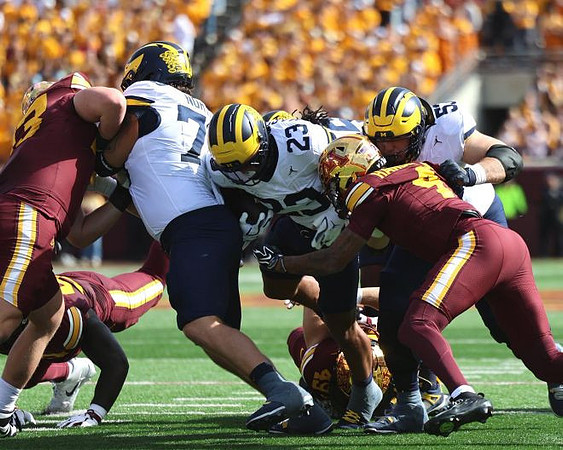 Brady Norton (70), Jordan Marshall (23), and Nathan Efobi (55)