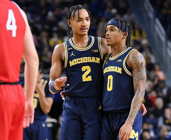 Kobe Bufkin (2) and Dug McDaniel (0)