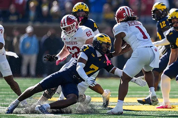 Chris Bracy (7), Chase Taylor (4), and Nathaniel Owusu-Boateng (12)