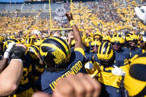 Bryce Underwood (19) and Michigan Team