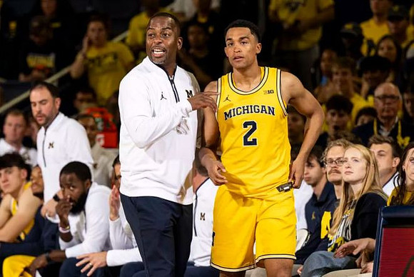 Mike Boynton Jr. and Kenny Noland (2)