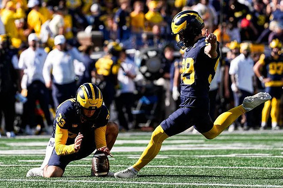Cam Brown (33) and Trey Butkowski (99)