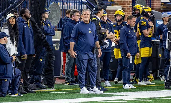Kyle Whittingham and Michigan Team
