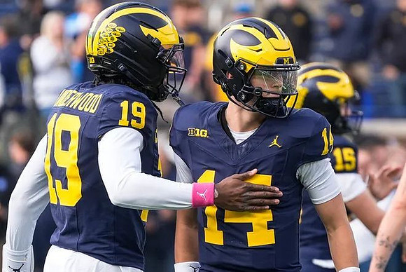 Bryce Underwood (19), Tommy Carr (14), and Chase Herbstreit (15)