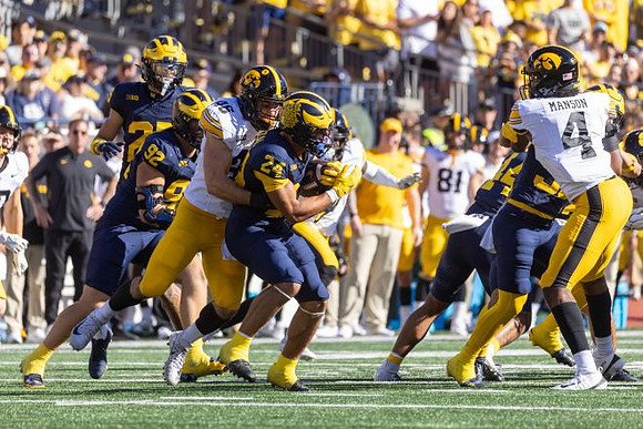 Ted Hammond (92), Bryson Kuzdzal (24), and Eli Owens (44)