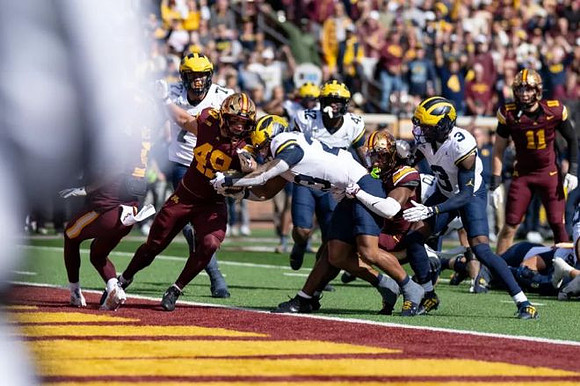 Jordan Marshall (23), Blake Frazier (77), Andrew Marsh (3), and Jalen Hoffman (42)